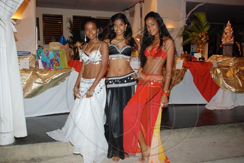 Janet Silvera Photo
 
Beauties of Shambala belly dancers from left, Amandah Spence, Shameika Dalley and Toni Spence.

**************************************************************************** at the Hanover Charities annual Sugar Cane Ball at the Round Hill Hotel last Saturday night.