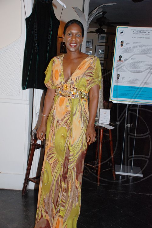 Janet Silvera Photo
 
Angella Whitter looking fab in this get up at the Hanover Charities Sugar Cane Ball at the Round Hill Hotel and Villas last Saturday night.