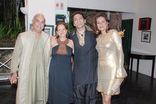 Janet Silvera Photo
 
From left: Kishim and Shobhu Samtani and Rajesh and Neha Kripalani look regal in their outfits.

********************************************************************North African at the Hanover Charities Sugar Cane Ball at the Round Hill Hotel and Villas last Saturday night.
