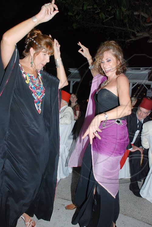 Janet Silvera Photo
 
Manuela Goren and Mexican Ambassador, Leonora Rhueda having their own 'ball'.

******************************************************************* at the Hanover Charities Sugar Cane Ball at the Round Hill Hotel and Villas last Saturday night.