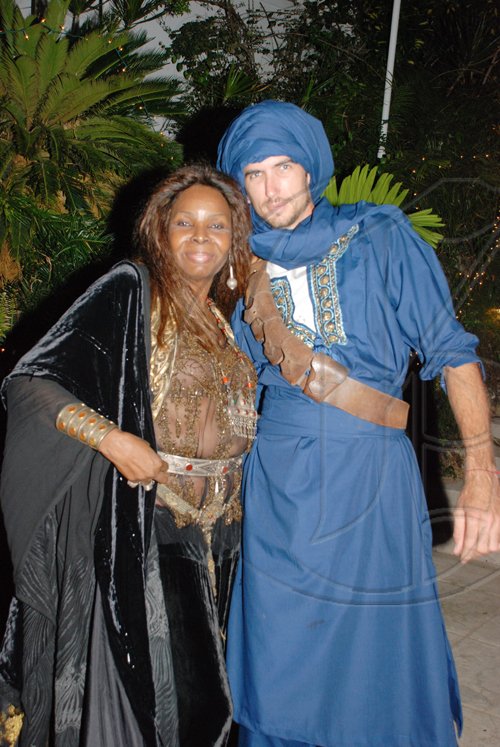 Janet Silvera Photo
 
Nerissa Baimbridge and the 'Blue Man of the desert' Atticus Walker-Toureg dressed to thrill.

****************************************************************at the Hanover Charities Sugar Cane Ball at the Round Hill Hotel and Villas last Saturday night.