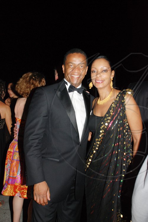Janet Silvera Photo
 One of the fabulous couples making a grand entrace at the Hanover Charities Sugar Cane Ball at the Round Hill Hotel and Villas last Saturday night, Earnest Michel and fiancee Clarissa Tanner.