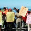 Adrian Frater photo                                                        Early protesters decided not to wait for their colleagues before starting their action along Howard Cooke Boulevard in Montego Bay, St James.