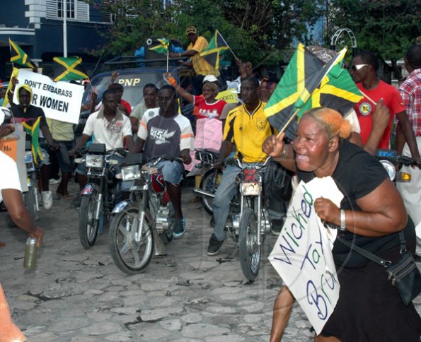 The PNP Region Six protest in Sam Sharpe Square moves into high car as a 50-strong group of motor cyclists from Eastern Hanover joins their colleagues in Sam Sharpe Square.