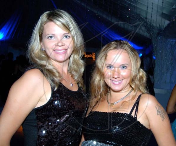 Winston Sill / Freelance Photographer
Olga Lim (left) and Maria Francis looking lovely.

Terra Nova All-Suite Hotel, New Year-Eve Ball, held on the lawns of the Hotel, Waterloo Road on Thursday night December 31, 2009.  (right).