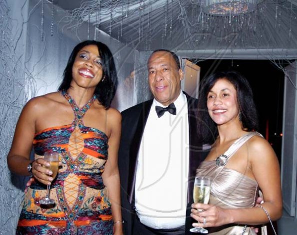Winston Sill / Freelance Photographer
Capt. David McCrae should be flying high with Judith Haughton (left) and Allison Haughton providing beauty on both sides.




Terra Nova All-Suite Hotel, New Year-Eve Ball, held on the lawns of the Hotel, Waterloo Road on Thursday night December 31, 2009. (right).