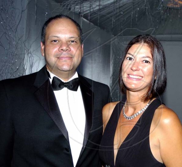 Winston Sill / Freelance Photographer
KFC boss Mark Myers and his wife Karen shine for the camera.

Terra Nova All-Suite Hotel, New Year-Eve Ball, held on the lawns of the Hotel, Waterloo Road on Thursday night December 31, 2009.