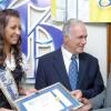Peta-Gaye Clachar/Freelance Photographer
Opinion page editor Colin Steer (right), receives his certificate from Chris Roberts and Miss Jamaica World, Kerrie Baylis,  marking 10 years at The Gleaner.

********************************************************************* company Long Service Awards at the Gleaner's North Street Office on Monday, September 21, 2009.