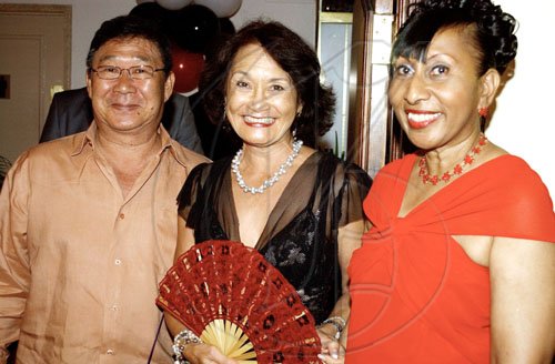 Winston Sill / Freelance Photographer
Michael Lyn (left), his wife Thalia (centre) and Ambassador Yvonne Gittens-Joseph are in a good mood at Trinidad and Tobago's 47th Independence Day reception, held at the Jamaica Pegasus hotel, New Kingston on Monday night.

******************************************************************************* August 31, 2009. Here are Michael Lyn (left) thalia Lyn (centre); and Ambassador Yvonne Gittens-Joseph (right).