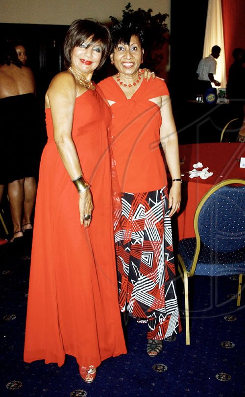Winston Sill / Freelance Photographer
Michelle Bovell (left);  poses for a celebratory photograph with Ambassador Yvonne Gittens-Joseph at the 47th anniversary of independence for Trinidad and Tobago at the Pegasus hotel on Monday.

*****************************************************************************************47th Independence Day Reception, held at the Jamaica Pegasus Hotel, New Kingston on Mondxay night August 31, 2009. Here are Michelle Bovell (left); and Ambassador Yvonne Gittens-Joseph (right).