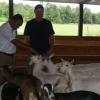 JIS PHOTO

                                                                                          Minister of Agriculture and Fisheries, Hon. Dr. Christopher Tufton (left), looking at some of the dairy goats belonging to goat farmer, John Oude Egberink (right), when the Minister and his delegation visited the Egberink Goat Farms in Ontario, Canada, recently.