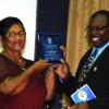 Colin Hamilton/freelance photographer
Golf lecturer Mrs. Gradle Grant receives an award from Dr. Neville Graham for her contribution to the 2008/2009 staging of the UTECH Knights Golf Classic during UTECH Annual Sports Awards Ceremony at the Alfred Sangster Auditorium on Thursday February 11, 2010.