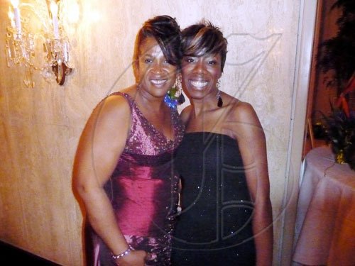 Beverly Hunter (left), one of the key members  behind the staging of the Inaugural UWI Toronto benefit gala, is happy to share the lens with Canadian singer and songwriter, Amoy Levy. 

*********************************************************************The two were at the gala held at the Four Seasons Hotel in Toronto, Canada.

Latoya Grindley/Staff Reporter
UWI Gala on Saturday February 27, 2010.