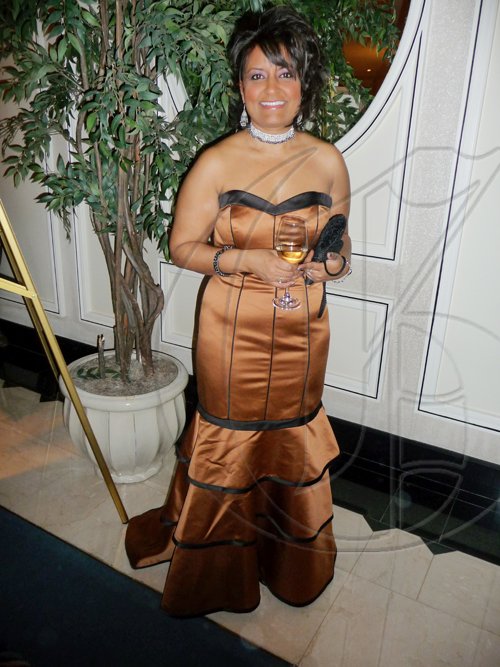 Stunning is certainly one of the first words that can be used to describe Dr Nandini Daljit in this beautiful stapless gown, which she wears with  poise.

****************************************************************************** at the Inaugural UWI Inaugural Toronto gala at the Four Seasons Hotel in Toronto, Canada. 

Latoya Grindley/Staff Reporter
UWI Gala on Saturday February 27, 2010.