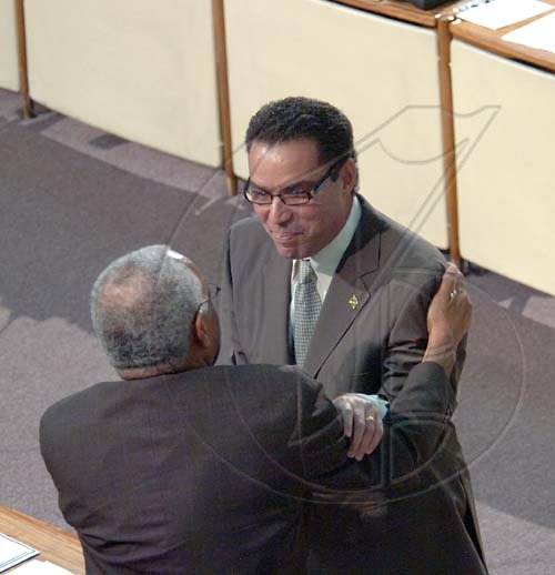 Rudolph Brown/Chief Photographer
Daryl Vaz, swearing as member of parliament for West Portland, at Gordon House on Tuesday, March 31-2009.