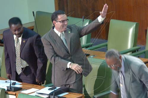 Rudolph Brown/Chief Photographer
Daryl Vaz, swearing as member of parliament for West Portland, at Gordon House on Tuesday, March 31-2009.