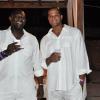 Janet Silvera Photo
 
Digicel's Dwayne Bennett (left) and CPJ's Marvin Campbell are caught on camera at 'The Weekend's' Vertigo All-White beach party at The Palmyra last week  Sunday.