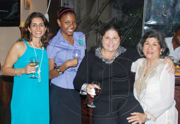 Janet Silvera Photo
From L- Host Veena Chandiram, CPJ?s Melissa Barnett and Laura Chandly and her mother-in-law, Jankin Chandiram at Le Club de Vin?s monthly wine meeting at the Chandiram?s home at The Lagoons in Montego Freeport last Thursday evening.