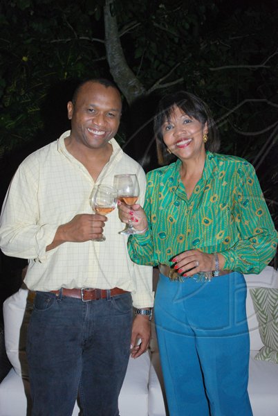 Janet Silvera Photo
From L- CPJ?s Devon Reid and president of the Cornwall Bar Association, Jeannie Robinson-Foster at the Le Club de Vin?s monthly wine meeting at Veena and Denny Chandiram?s home at The Lagoons in Montego Freeport last Thursday evening.