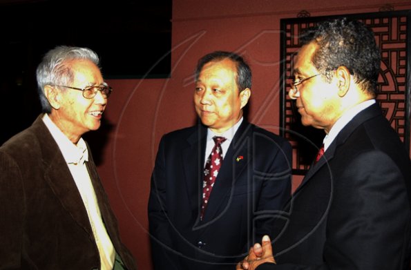 Winston Sill / Freelance Photographer
Professor Anthony Chen (left) raps with Chinese Ambassador Chen Jinghua (centre) and Deputy Prime Minister Dr Ken Baugh.

The Jamaica China Friendship Association (JCFA) banquet to celebrating the 60th Anniversary of the Founding of The Peoples's Republic of China, held at Jade Garden Restaurant, Sovereign Centre on Sunday October 11, 2009.