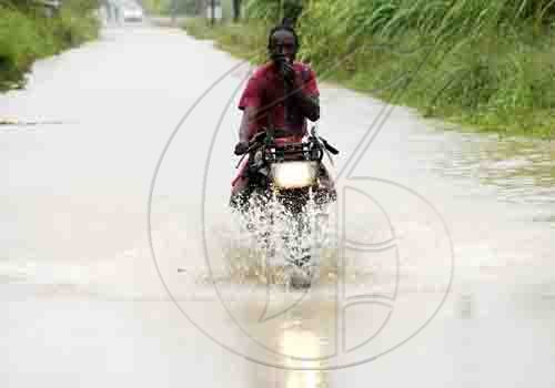 Rudolph Brown/Photographer
Heavy rain fall flood major road in St. Thomas on Sunday, April 18-2010