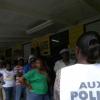 Ricardo Makyn/Staff Photographer
A one day police looking on at the? Mount Pleasant All Age Polling Station.